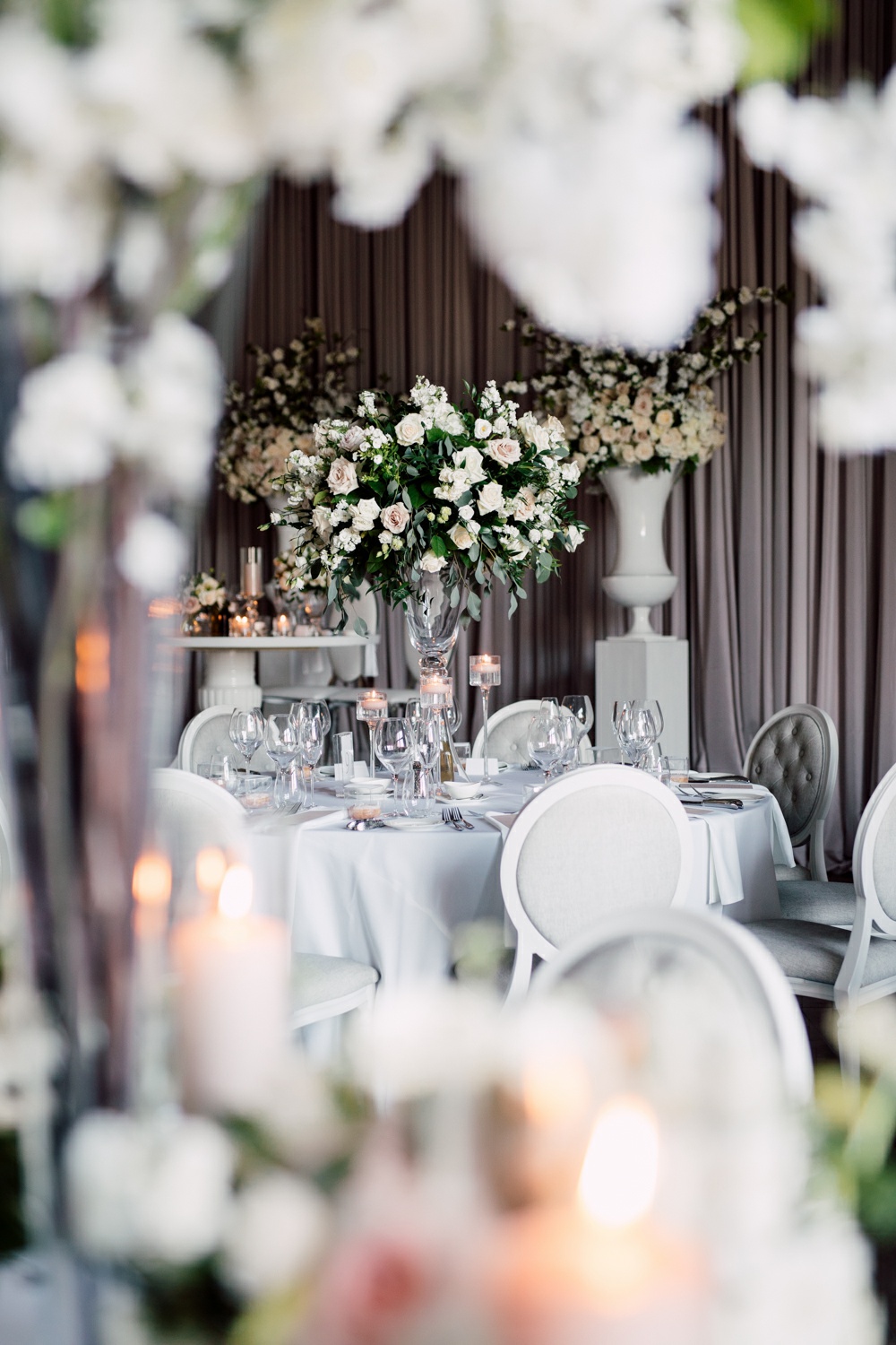 Elegant white and grey wedding venue decor