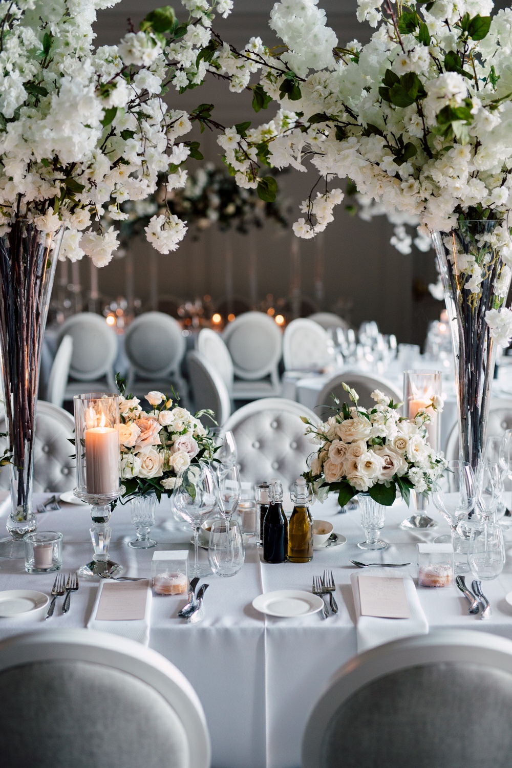 Elegant white and grey wedding venue decor