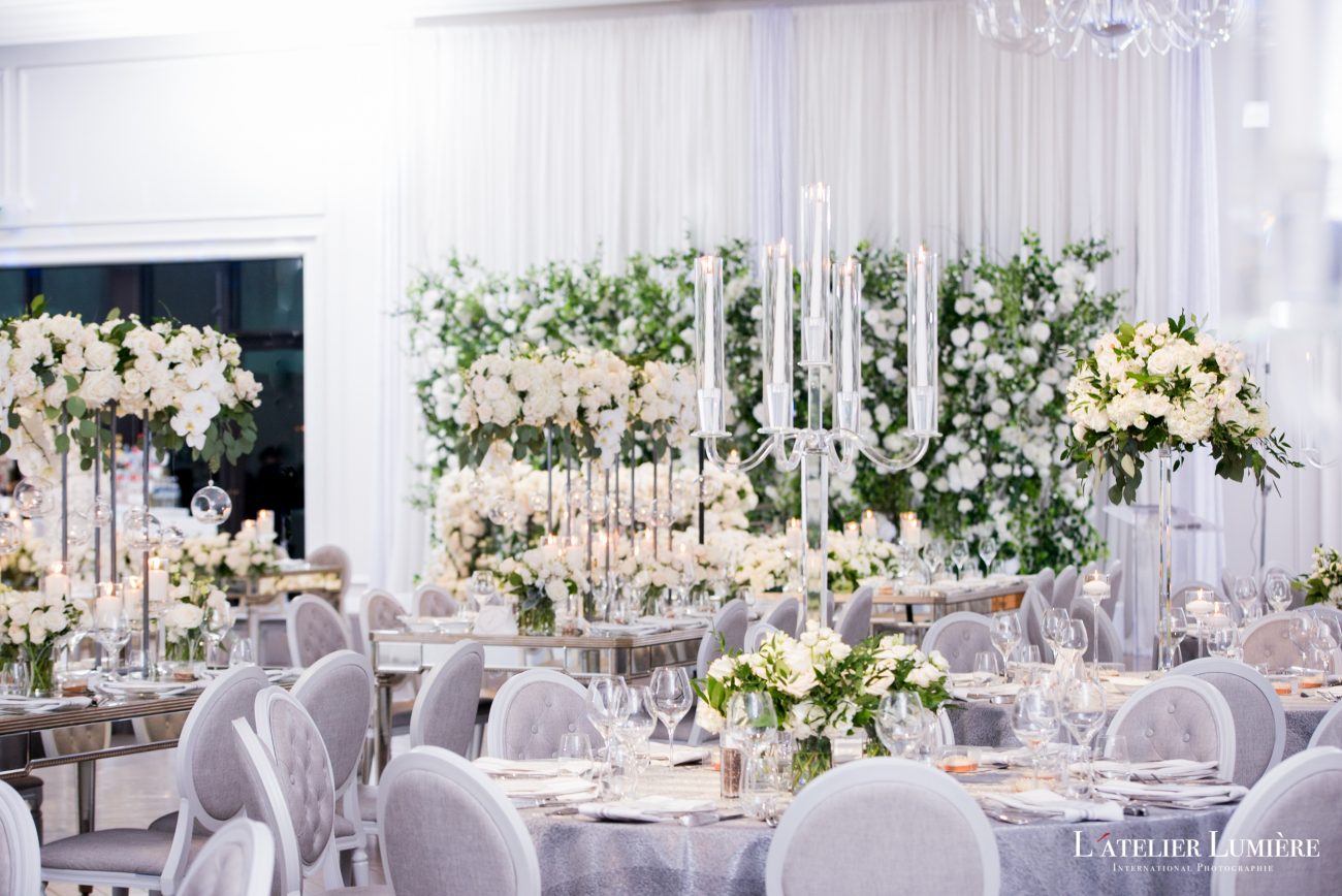 Elegant glass and white roses wedding decor