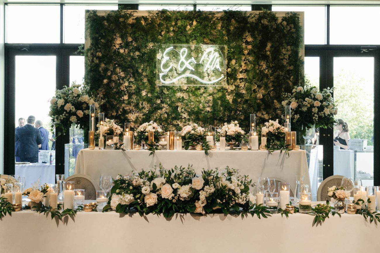 The West Wing Blush roses and greenery wall feature