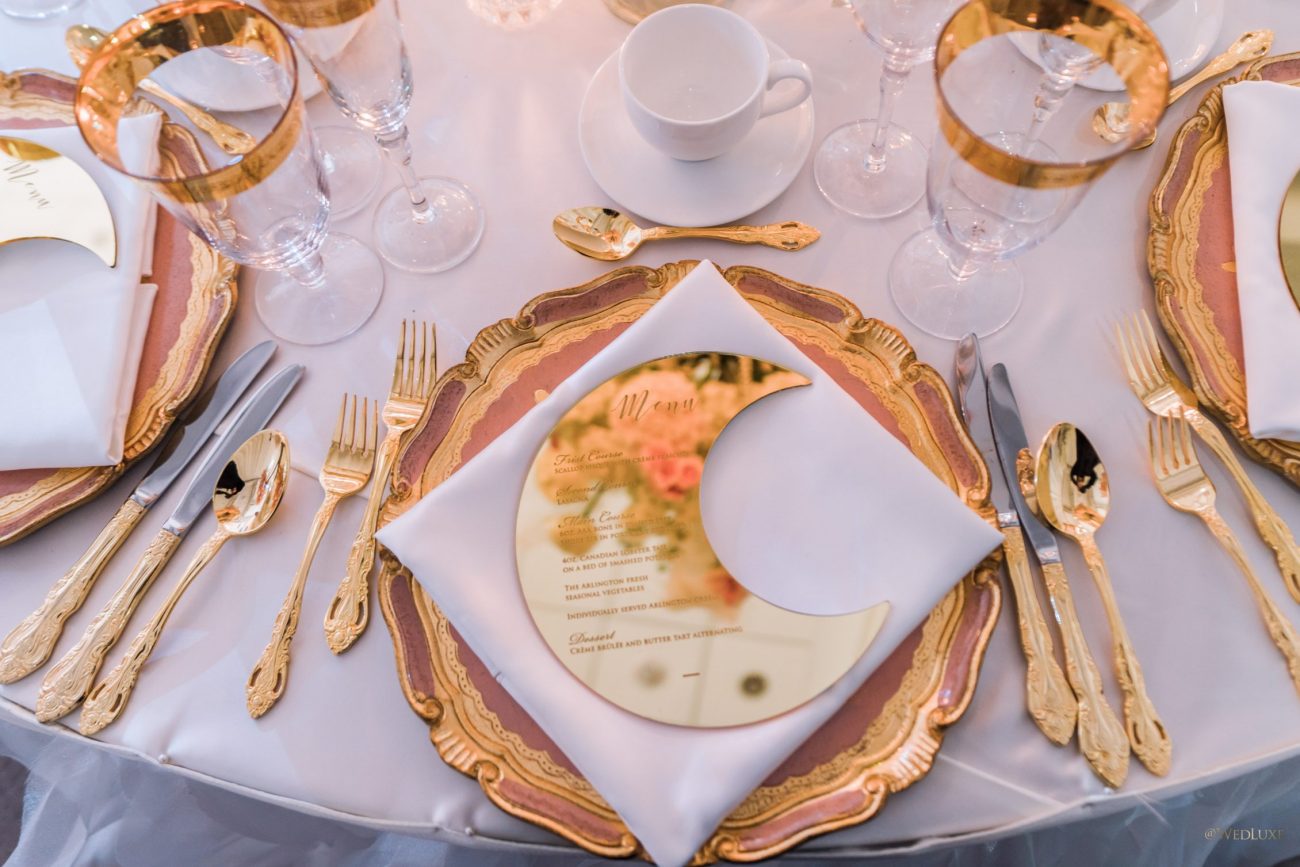 golden half moon menu with gold cutlery and plates
